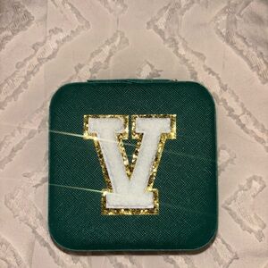 Green Jewelry Box with Gold and White V